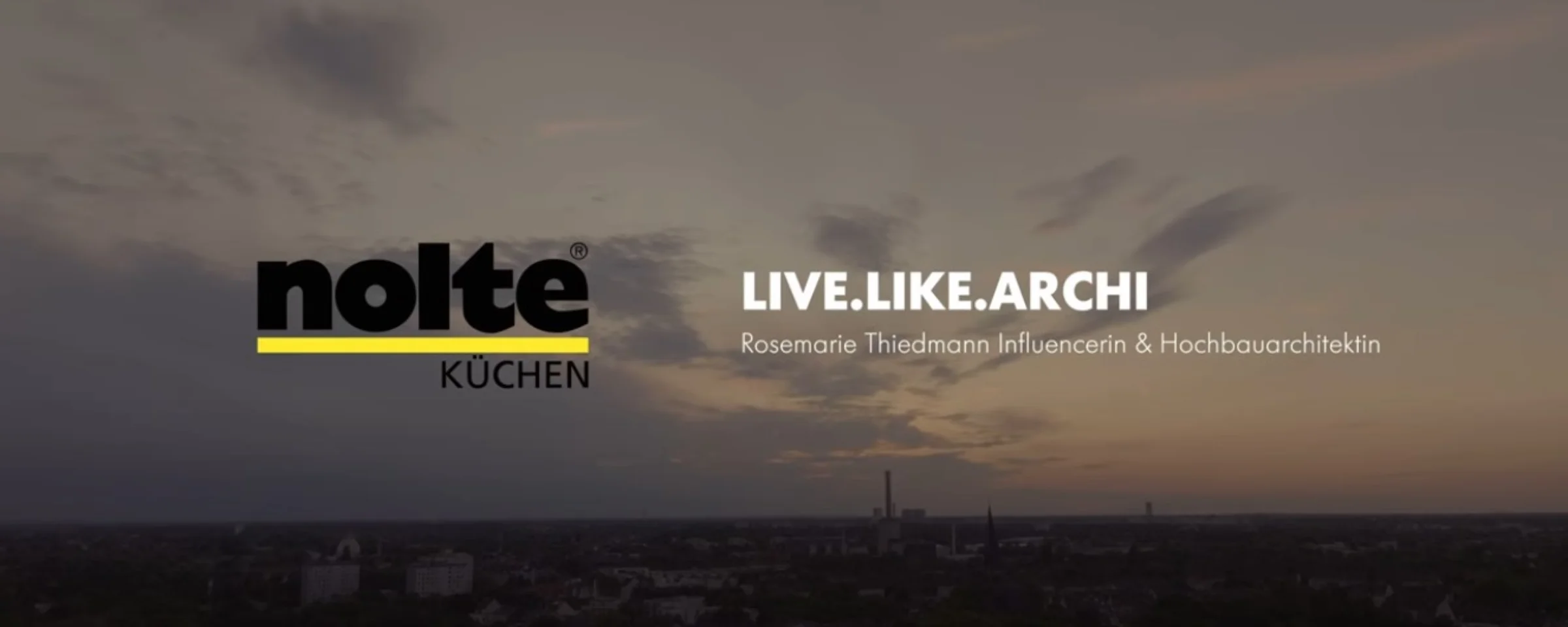 A cityscape at sunset with the Nolte Kitchen logo above.