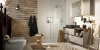 Een moderne badkamer met douche en wastafel van Nolte SPA.