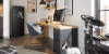 A modern office with a desk, chair, and decor by Nolte Living.