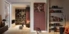 Una sala de estar moderna con estantes y decoraciones, Nolte Living.