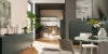 Een moderne woonkamer met groene meubels en decoraties, ontworpen door Nolte Living.