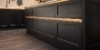Une cuisine moderne avec des armoires sombres et des fleurs sur le comptoir, Nolte Kitchen.