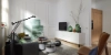 Ein modernes Wohnzimmer mit stilvollen Möbeln und Dekorationen, Nolte Living.