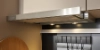 A modern kitchen unit with a range hood and knife holder, Nolte Kitchen.