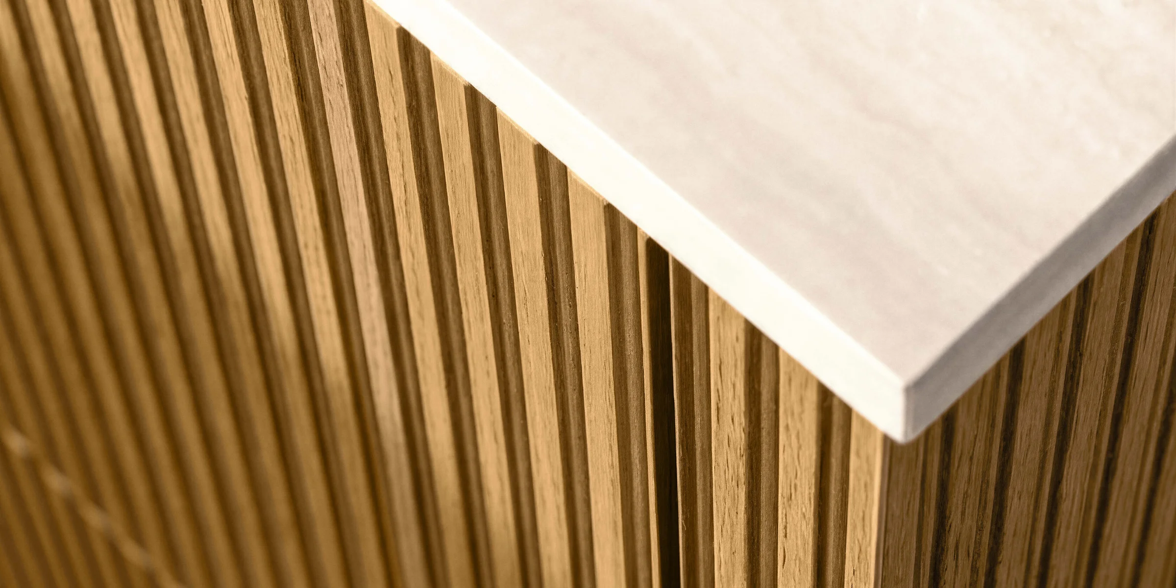 Modern kitchen design with elegant wood texture and bright countertop. Nolte Küchen.