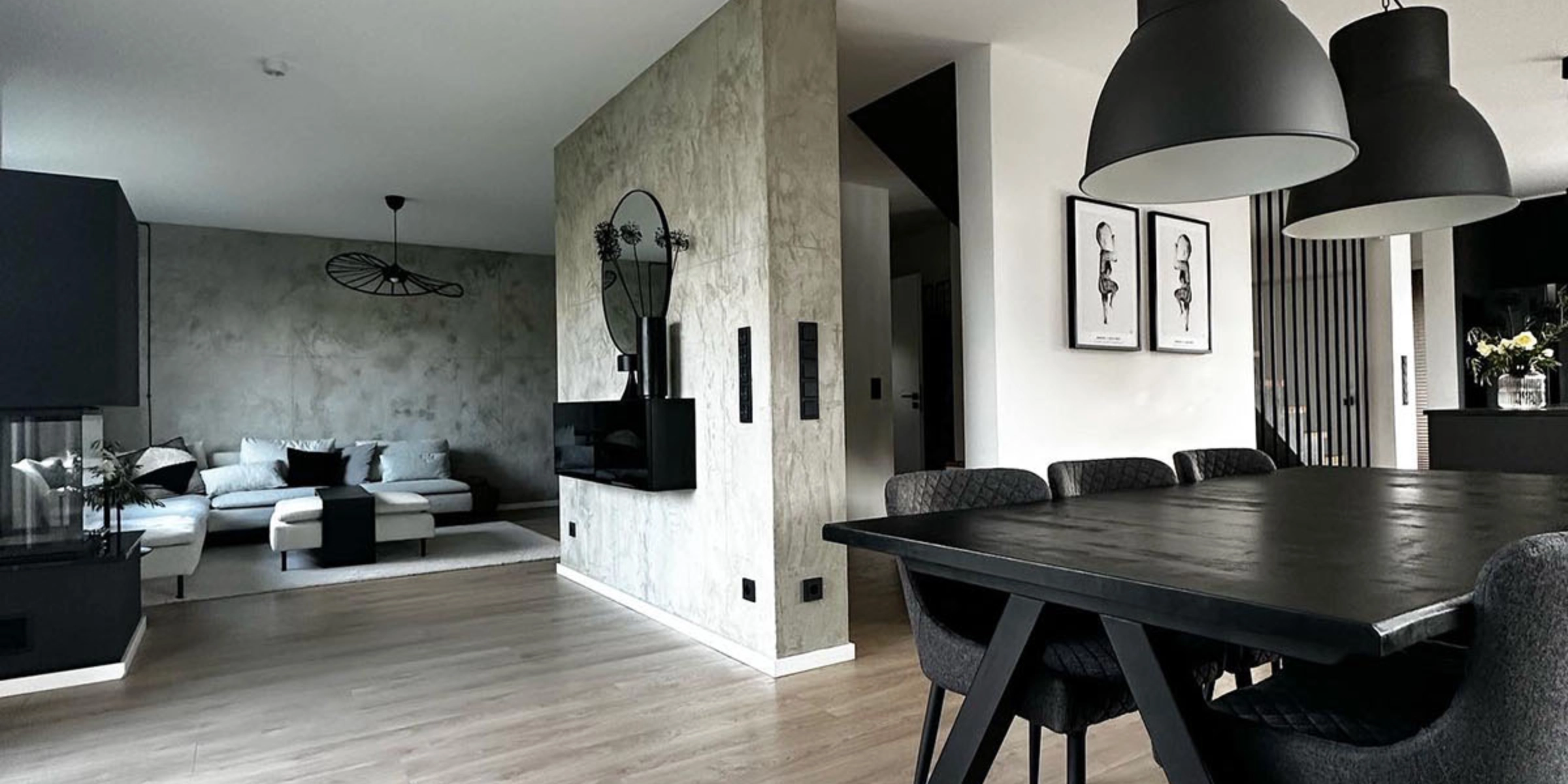 Un salon moderne avec coin repas et meubles élégants, présenté par Nolte Living.