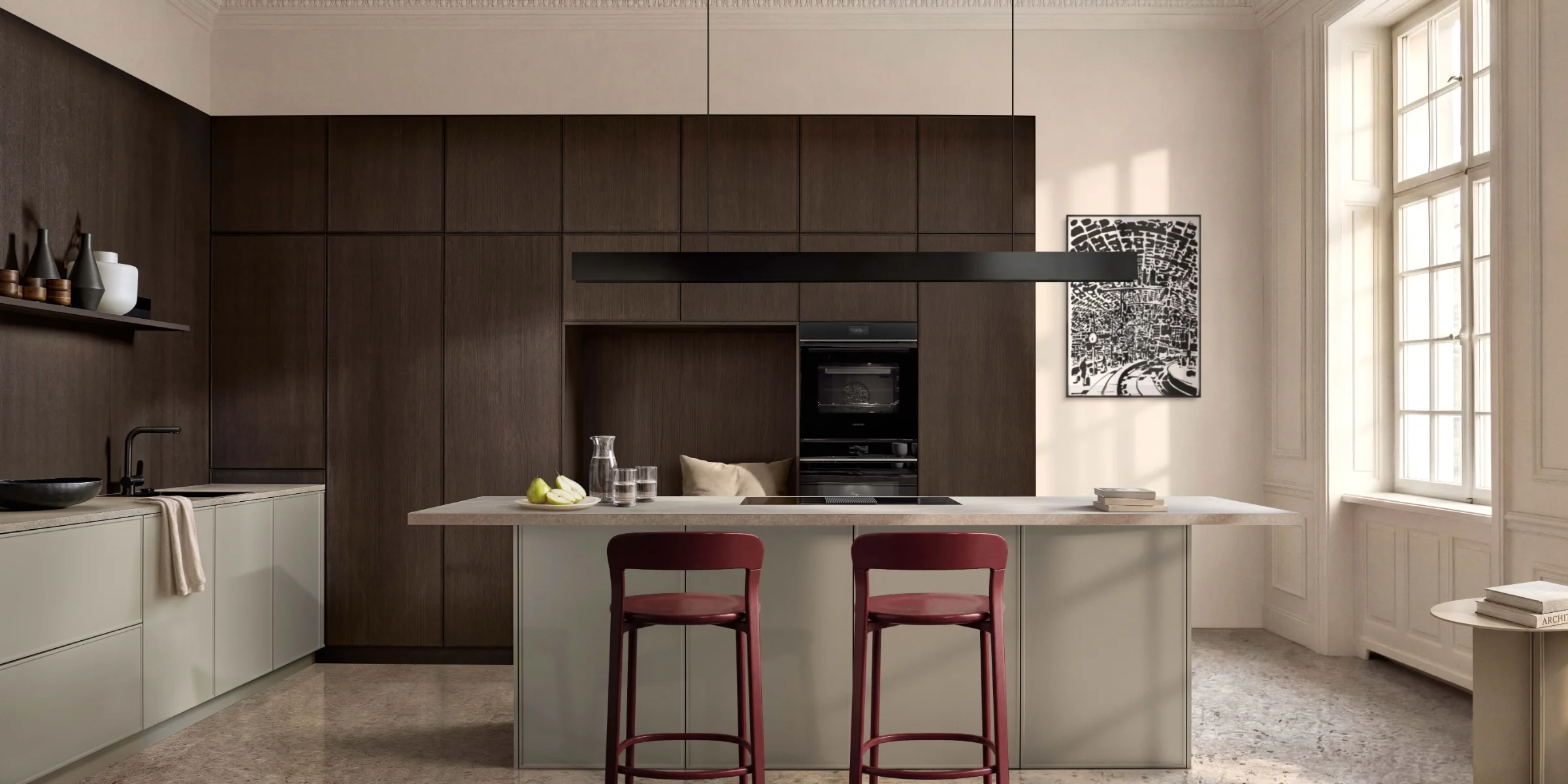 In the elegant kitchen with an island, there are two red barstools. Nolte Kitchens.