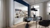 Een modern woonkamer met een stijlvol boekenrek, tafel en stoelen, passend bij Nolte Living.