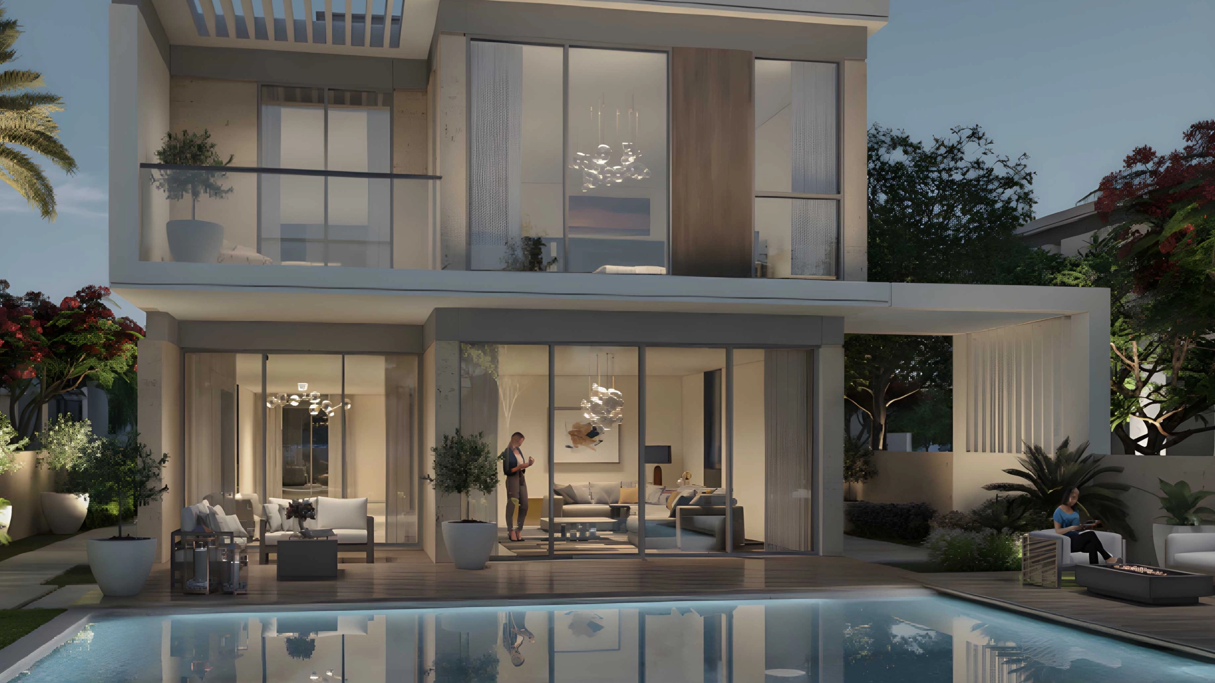 Ein modernes zweistöckiges Haus mit großer Glasfassade und Pool im Vordergrund bei Abenddämmerung.
