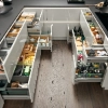 Une cuisine moderne avec tiroirs ouverts et beaucoup de rangement, présentée par Nolte Kitchen.