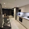 Cucina moderna con tavolo da pranzo e divano, Nolte Kitchen.