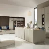 A modern kitchen with an island and seating area, Nolte Küchen.