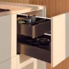 An open kitchen drawer with a modern design. Nolte Küchen.