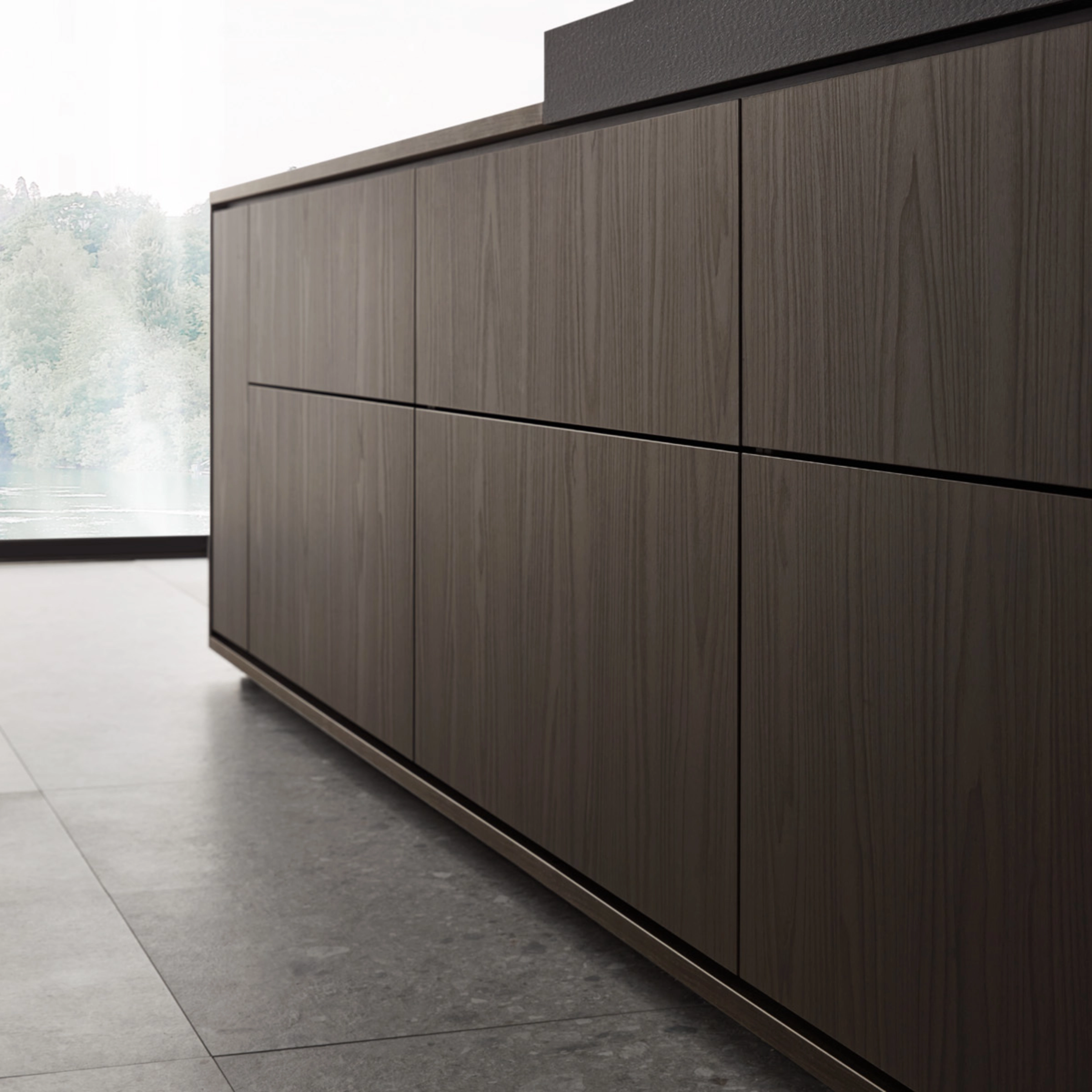 Une cuisine moderne avec façades en bois et vue extérieure, conçue par Nolte Kitchen.