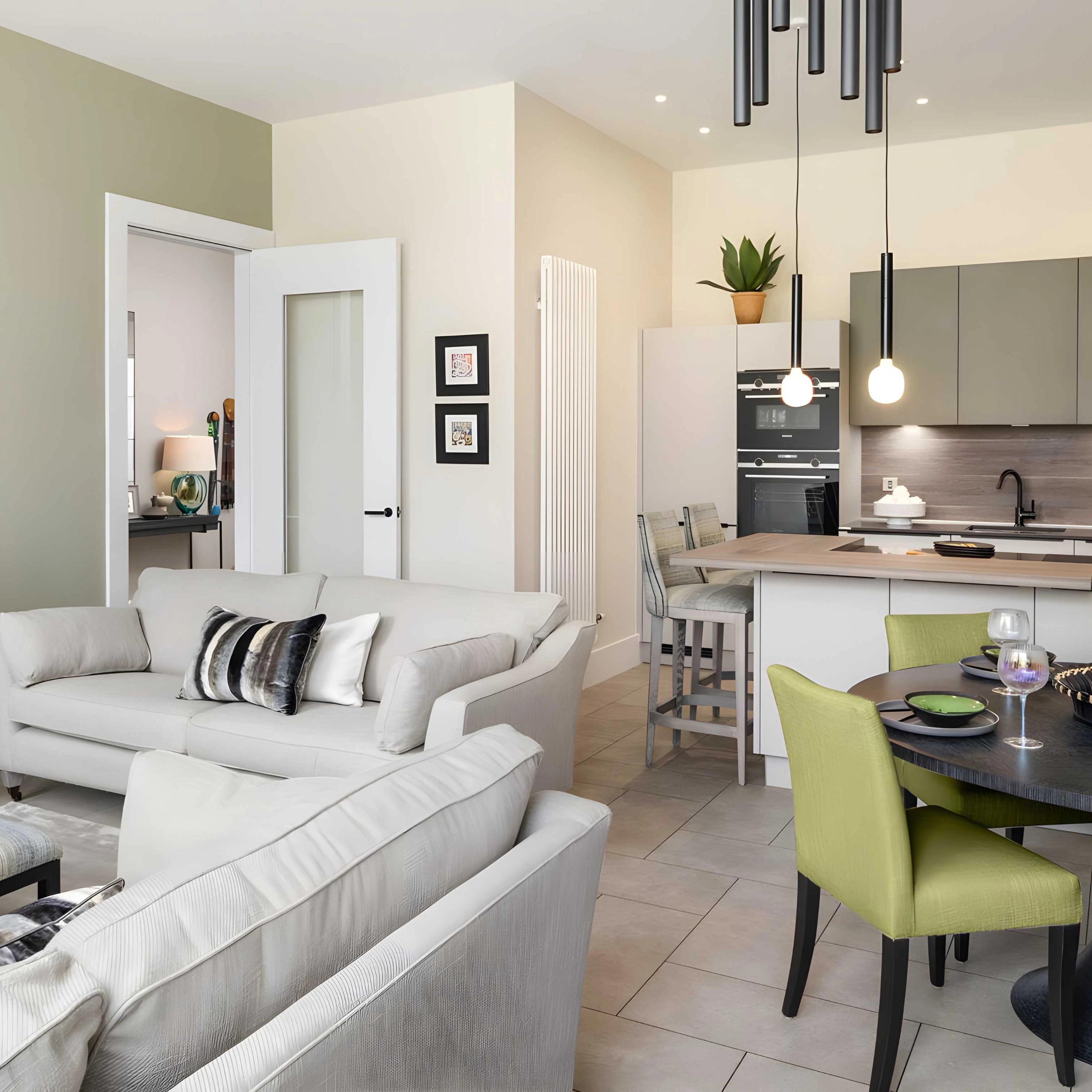 Wohnzimmer mit modernen Möbeln, Essbereich und offener Küche, gestaltet von Nolte Living.