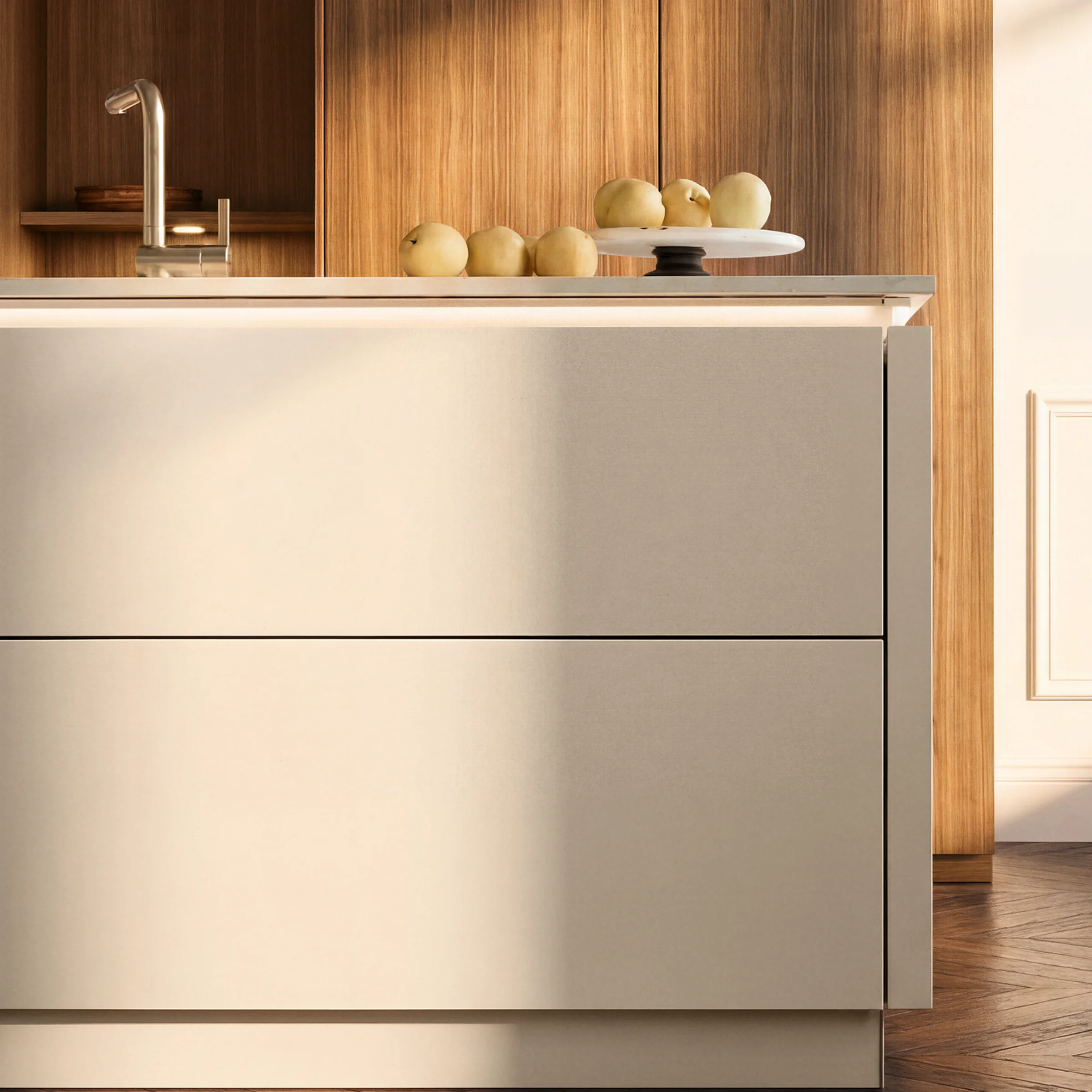 Eine moderne Küche mit einer Arbeitsfläche und Äpfeln darauf. Nolte Küchen.