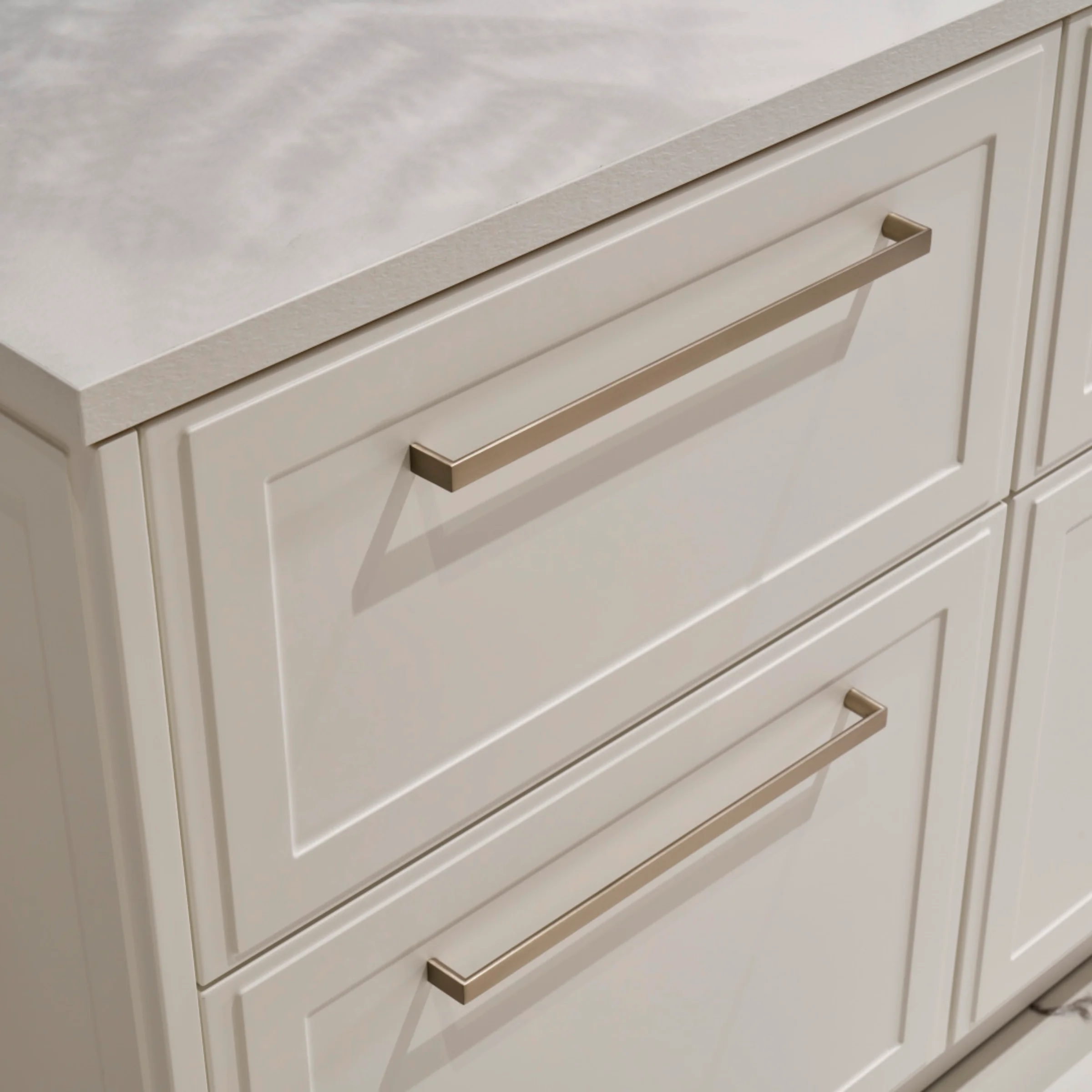 A sleek white kitchen drawer with modern handles, Nolte Kitchens.