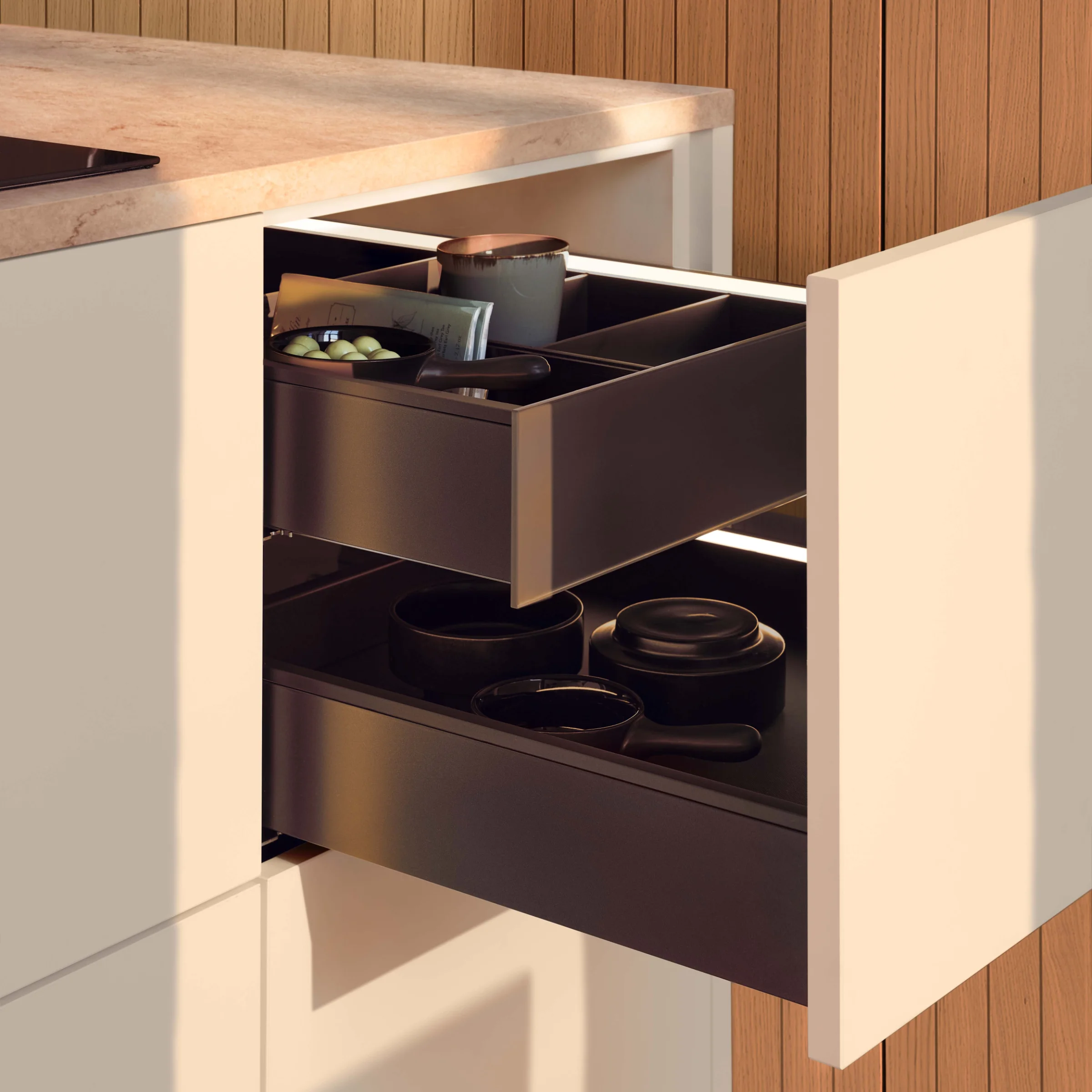 An open kitchen drawer with a modern design. Nolte Küchen.