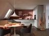 Cuisine moderne avec table à manger et chaises aux couleurs élégantes. Nolte Kitchen.