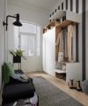 Un couloir élégant avec une armoire de Nolte Living.