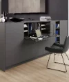 Een moderne woonkamer met grijze kasten en een klaptafel, Nolte Living.