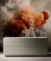 Cuisine moderne avec îlot central et fumée artistique en arrière-plan, Nolte Kitchen.